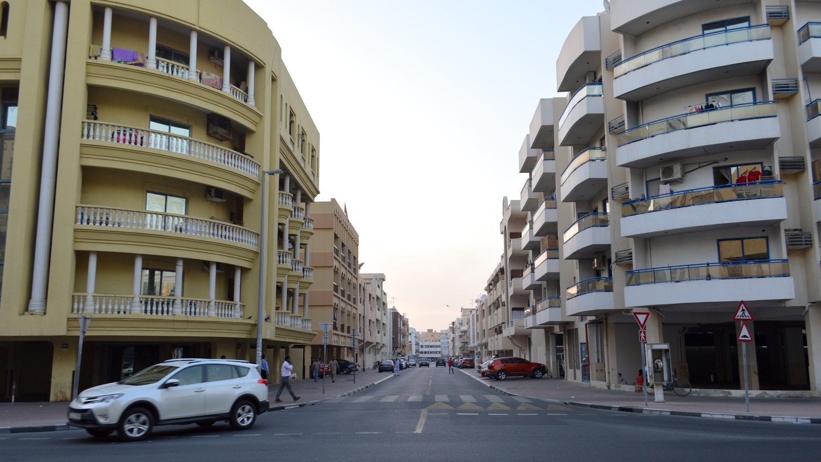 Apartment buildings with balconies along a street in Bur Dubai