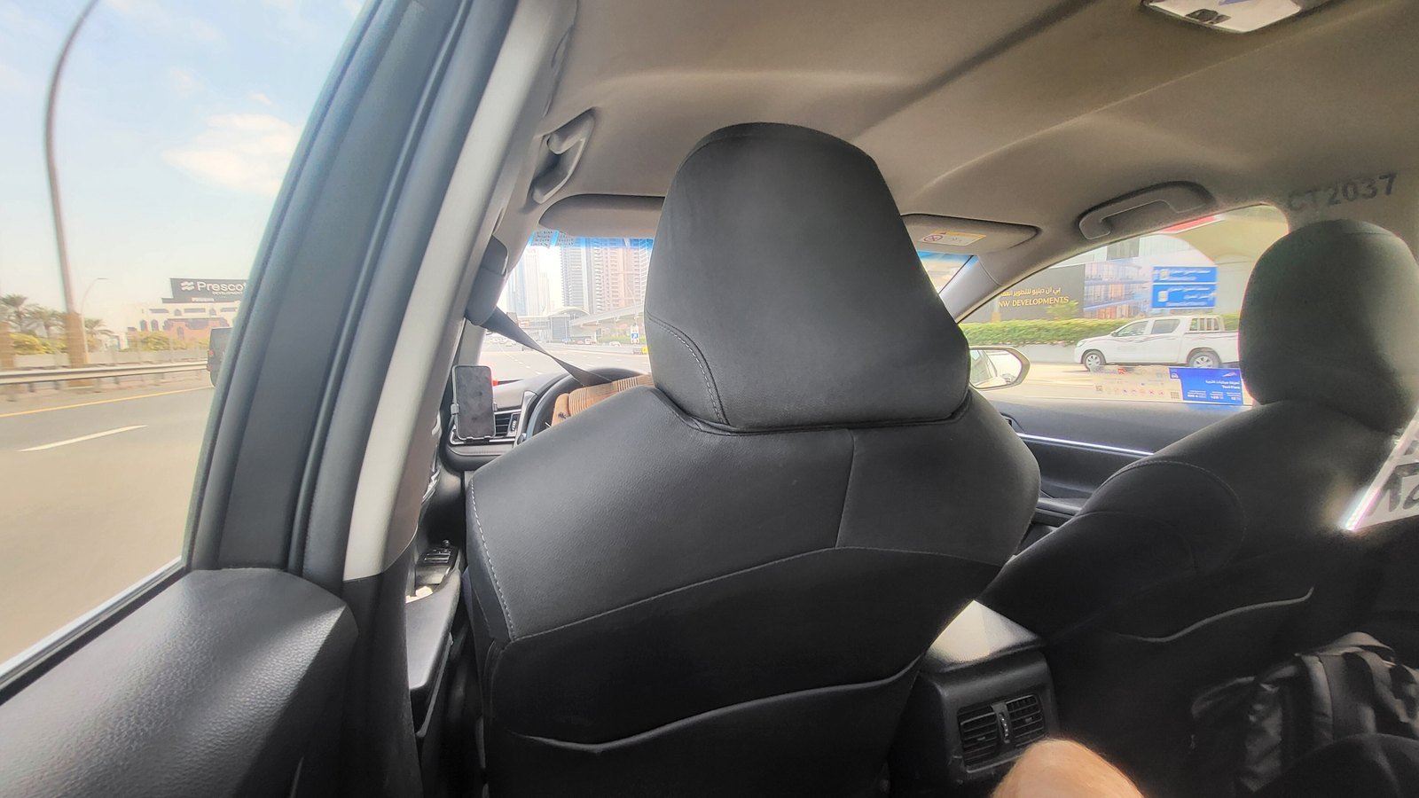 View from the back seat of a car on a Dubai highway